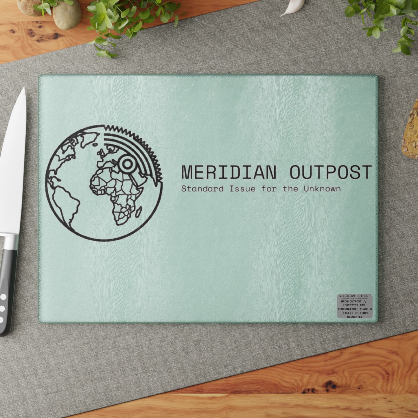 Logistics Division Meridian Outpost Glass Cutting Board — "Standard Issue for the Unknown" Globe Design
